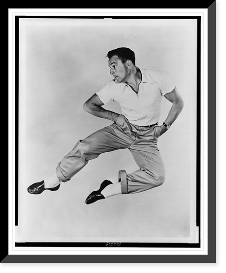Gene Kelly, full-length portrait, in mid-air dance maneuver, facing left, Vintage Poster