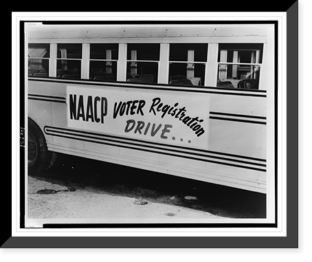 Historic Framed Print, [Sign on side of school bus NAACP voter registration drive ..."].photography by Muscella.",  17-7/8" x 21-7/8"