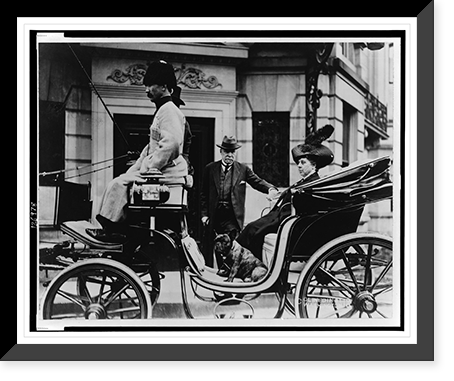 George Bakhmeteff standing alongside carriage on which his wife is seated, with dog, Vintage Print