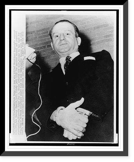 Jack Ruby, half-length portrait, handcuffed, facing front, leaving jail for mental and physical examination, Vintage Poster