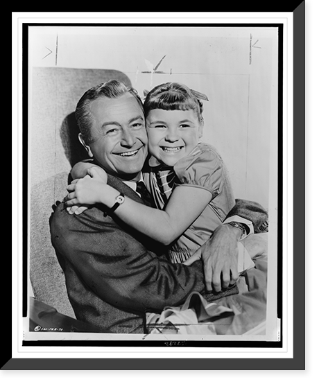 Robert Young and Lauren Chapin embracing, half-length portrait, seated, facing front Classic, Antique Wall Art