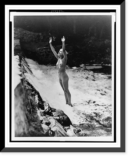 Historic Framed Print, [Nude young woman posed, standing in stream, with hands raised].Alfred Cheney Johnston.,  17-7/8" x 21-7/8"