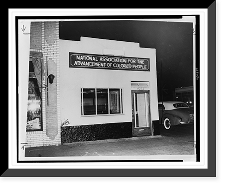 Exterior of newly appointed branch office of NAACP at 4272 South Central Ave., Los Angeles, California, at night with neon sign.Havies(?), L.A, Antique Print