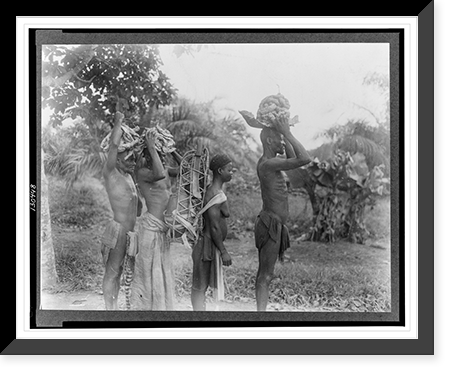 African men and woman arriving at the monthly wild rubber village market, carrying rubber and supplies, Lebango, Moyen Congo.photo by Brazzaville Bureau, OWI, Historic Print