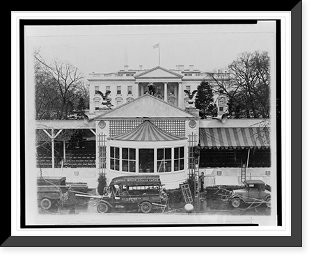 Historic Framed Print, Workmen placing the finishing touches on the reviewing stand in the Court of Honor from which Mr. Hoover will review the inaugural parade,  17-7/8" x 21-7/8"