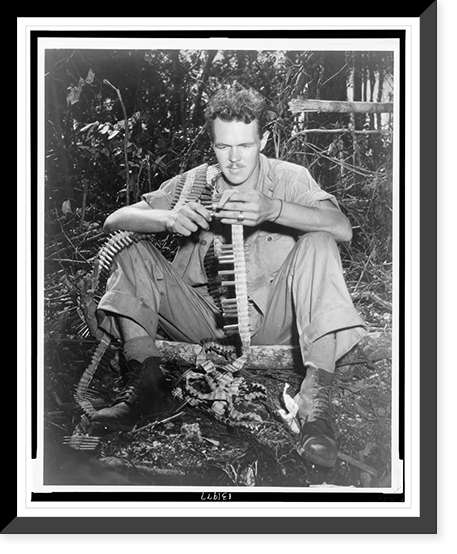 Historic Framed Print, Sgt. Elmer McGlynn of Seattle,  Wash.,  helped cut down six Japs with a BAR [Browning Automatic Rifle] when they tried to wipe out a machine gun covering his platoon's advance".photo by Sgt. John Bushemi.",  17-7/8" x 21-7/8"