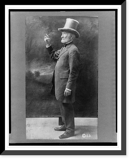 Joseph Cannon, full-length portrait, standing, facing right, wearing top hat and holding up cigar, Antique Wall Art
