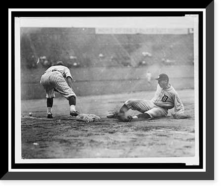Historic Framed Print, [Detroit ball player slides safely into third base as fielder reaches to the left for ball on the ground during baseball game],  17-7/8" x 21-7/8"