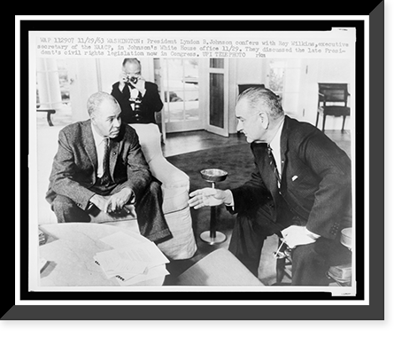 Historic Framed Print, [Roy Wilkins (left) confers with President Lyndon B. Johnson at the White House about civil rights legislation],  17-7/8" x 21-7/8"