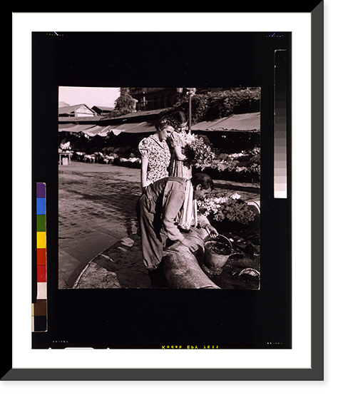 Se&ntilde;ora Chavela Eastman de Edwards and daughter Sonia watching man dipping water from fountain, Santiago, Chile, Antique Poster