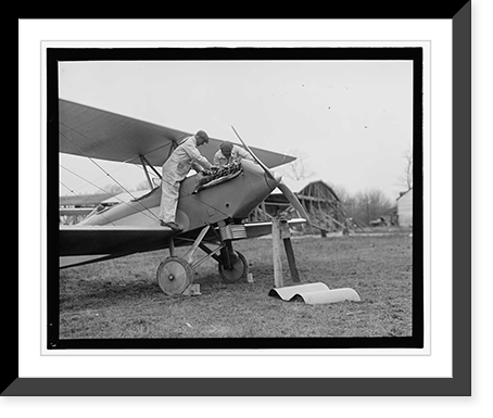 Historic Framed Print, [Men examining airplane engine],  17-7/8" x 21-7/8"