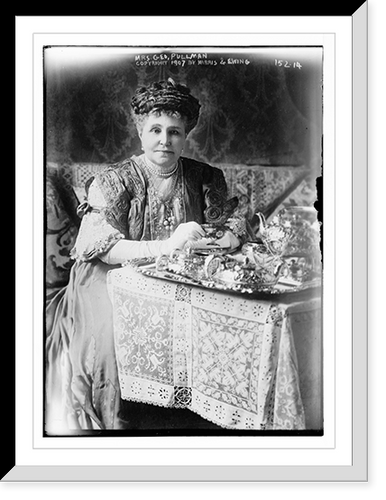 Mrs. Geo. Pullman, at tea table, copyright by Harris & Ewing.Harris & Ewing, Historic Reproduction