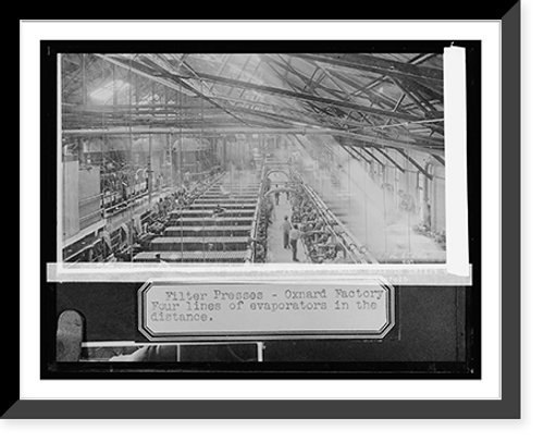 Historic Framed Print, Filter presses, Oxnard, [California], factory, four lines of evaporators in the distance,  17-7/8" x 21-7/8"