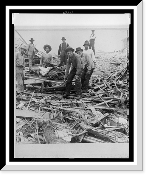 Historic Framed Print, Carrying out bodies just removed from the wreckage Galveston,  17-7/8" x 21-7/8"