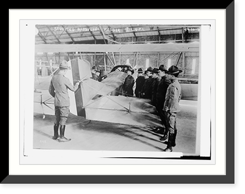 Historic Framed Print, Studying plane rudder,  17-7/8" x 21-7/8"