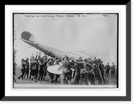 Righting an overturned plane . Fr. Classic, Vintage Wall Art