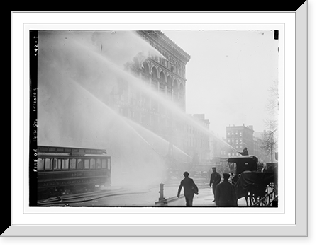 Historic Framed Print, Firemen spraying burning building on 14th St., trolley in foreground, New York - 2,  17-7/8" x 21-7/8"