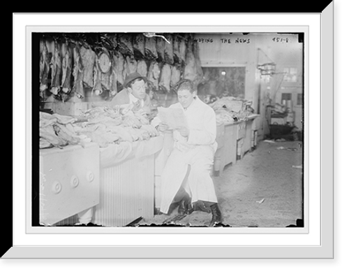 Historic Framed Print, Butchers read newspaper at the counter full of meat during meat boycott,  17-7/8" x 21-7/8"