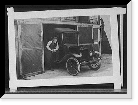 Man posed with automobile halfway out of garage Classic, Vintage Print