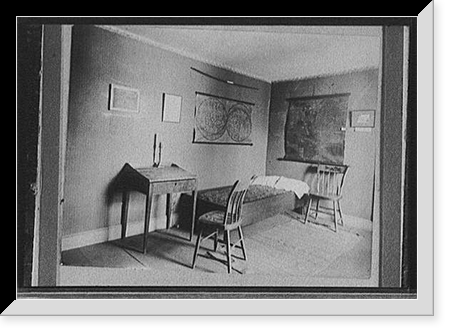 Bedroom with maps on wall, possibly in historic house or museum, Antique Print