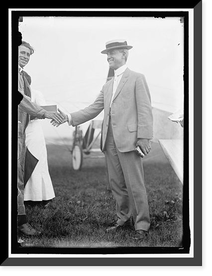 RUSSELL, EDGAR. MAJ., SIGNAL CORPS, U.S.A. RIGHT, SHAKING HANDS WITH AVIATOR WOOD, Antique Wall Art