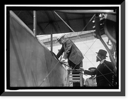 NATIONAL AERO COAST PATROL COMMN. CURTISS BIPLANE 2 ENGINES, WITH FLOATS, EXHIBITED AT S.O.B. SEN. BEN TILLMAN CLIMBING INTO PLANE; AUGUSTUS POST AT RIGHT, Historic Reproduction