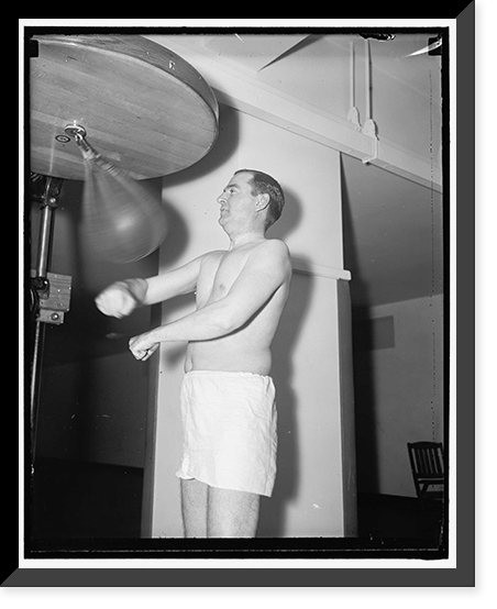Rep. Albert Thomas of Tex. punching the bag at the House gym, Antique Poster