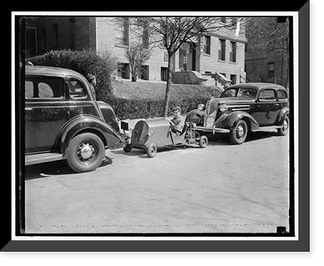 Washington youngster solves parking problem. Washington, D.C., March 30. Transportation and no parking worries, Historic Reproduction