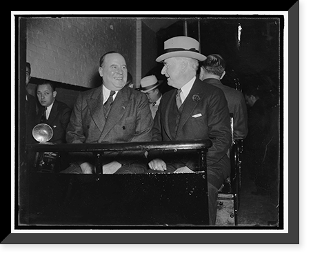 On way to special session. Washington, D.C., November 15. Senator Champ Clark of Missouri and Senator Royal S. Copeland, of New York, travel the senate subway on their way to the opening of the spe