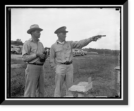 Winner and runner up in Treasury shoot. Washington, D.C., Aug 10. Averaging 298 out of a possible 300 bullseyes, L.E, Historic Reproduction