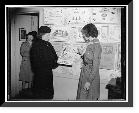 Wife of Acting Navy Secretary views prize winning needlework of girl scouts. Washington, D.C., Nov. 4. Mrs, Vintage Print