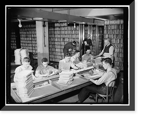 Historic Framed Print, Patent Office files. Washington, D.C., Feb. 29. Employees in the patent office file room. Approximately 2,180,00 patents are kept on file for public use, 2-29-40,  17-7/8" x 21-7/8"