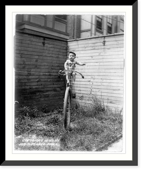 Baby on large unicycle held up by ropes, Antique Poster