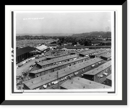 Puyallup (Wash.) Assembly Center - construction crews are still on the job, though from the wash lines the evacuees are there too, Historic Reproduction
