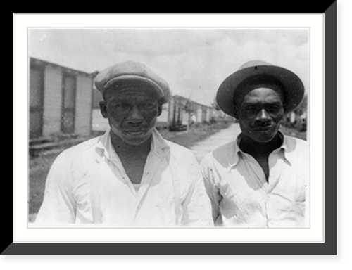 Historic Framed Print, [Roger Mathews and Booker T. Sapps, half-length portrait, Belle Glade, Florida],  17-7/8" x 21-7/8"