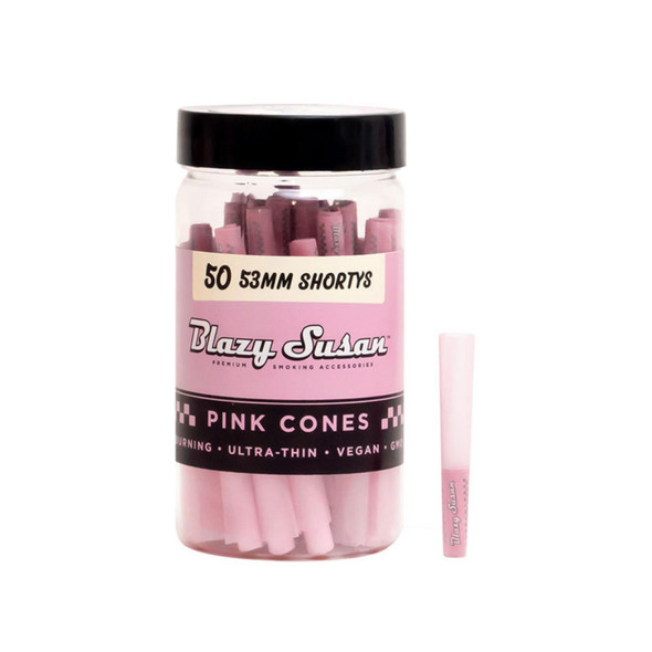 A stylish jar of Blazy Susan 53mm Shorty Pink Pre-Rolled Cones, featuring 50 compact, ultra-thin pre-rolled cones in an attractive pink hue. The cones are crafted from 100% organic materials, designed for a slow and even burn. Perfect for smokers who prefer a more discreet and eco-friendly option.