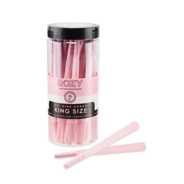 A bulk tub of Rozy Pink King Size Pre-Rolled Cones containing 50 cones, each pre-rolled with filter tips. The image showcases the bright pink packaging with the distinctive rose logo, designed to catch the eye and stand out on any shelf. Ideal for smokers looking for a stylish, high-quality, and charitable smoking accessory.