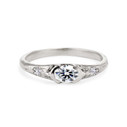 Platinum nature inspired oval ring with three diamonds  by Olivia Ewing Jewelry