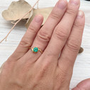 Engagement ring with emerald by Olivia Ewing Jewelry