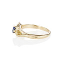 Gold blue sapphire engagement ring by Olivia Ewing Jewelry