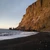 Black lava beach below the cliffs at Vík on the south coast of Iceland