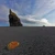 Rock spire on the black sand plain of Mýrdalssandur, south Iceland