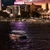 Nile waterfront at night with a moored cruise boat, Egypt