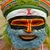 Melpa man in full sing sing bilas with painted face and beaded headdress, Mt Hagen, Papua New Guinea Highlands