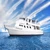 Atlantis Adventurer liveaboard at anchor in calm blue water, Visayas, Philippines