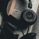 Grado SR325X Prestige Headphones laid on book