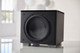 REL Acoustics HT/1205 MKII Subwoofer (Black) in a white living room