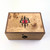 Dice box with marquetry lid featuring evil eye