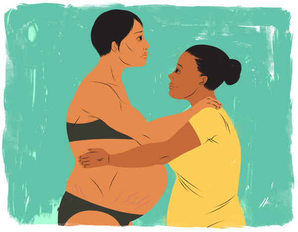 Doula helping a muscular mother during labor