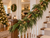 Robert Stanley Christmas Classics 6 ft artificial cedar garland with realistic green foliage and flexible brown branch